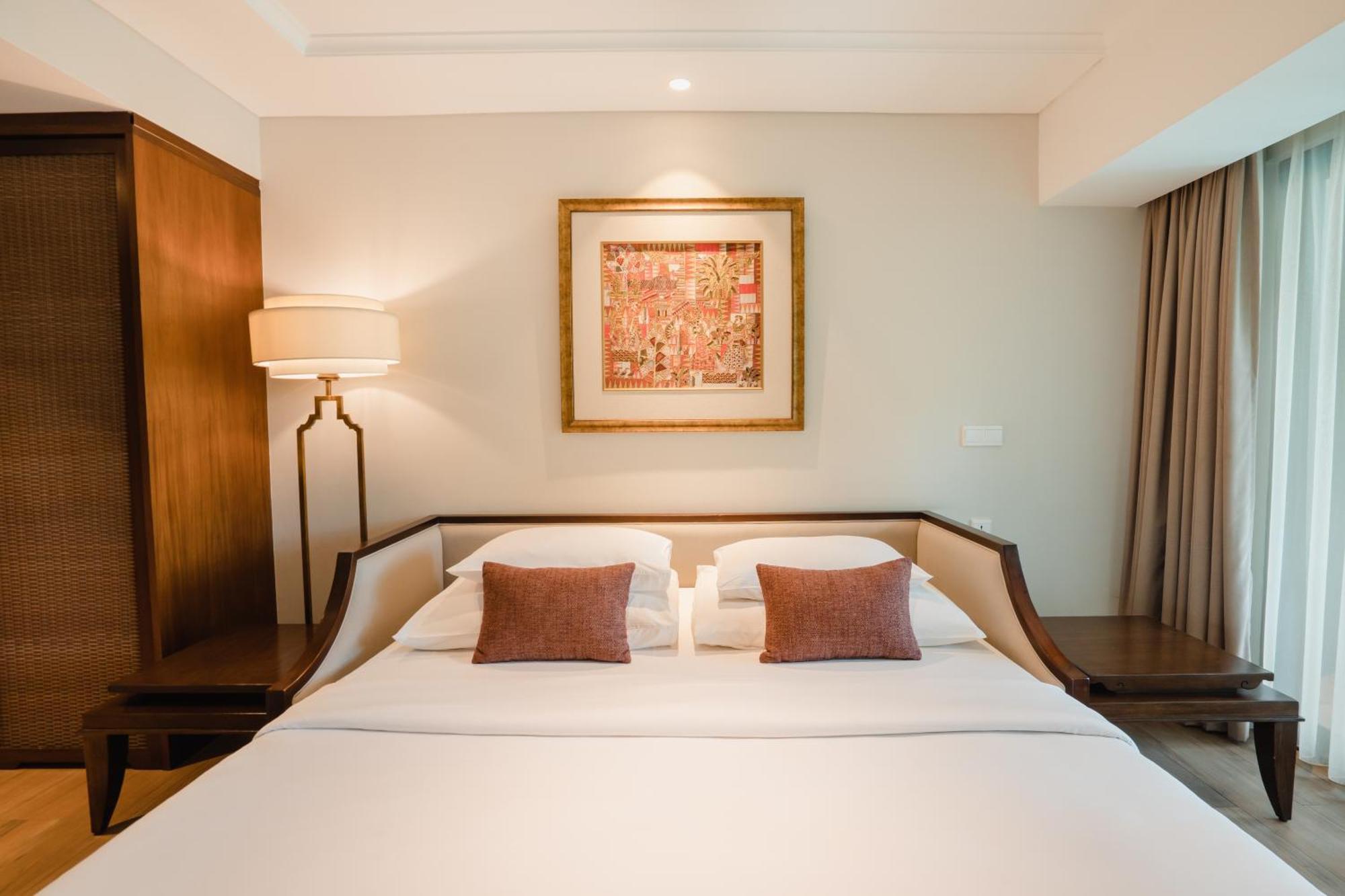 라마야나 스위트 앤 리조트 꾸따 외부 사진 A bedroom at the hotel